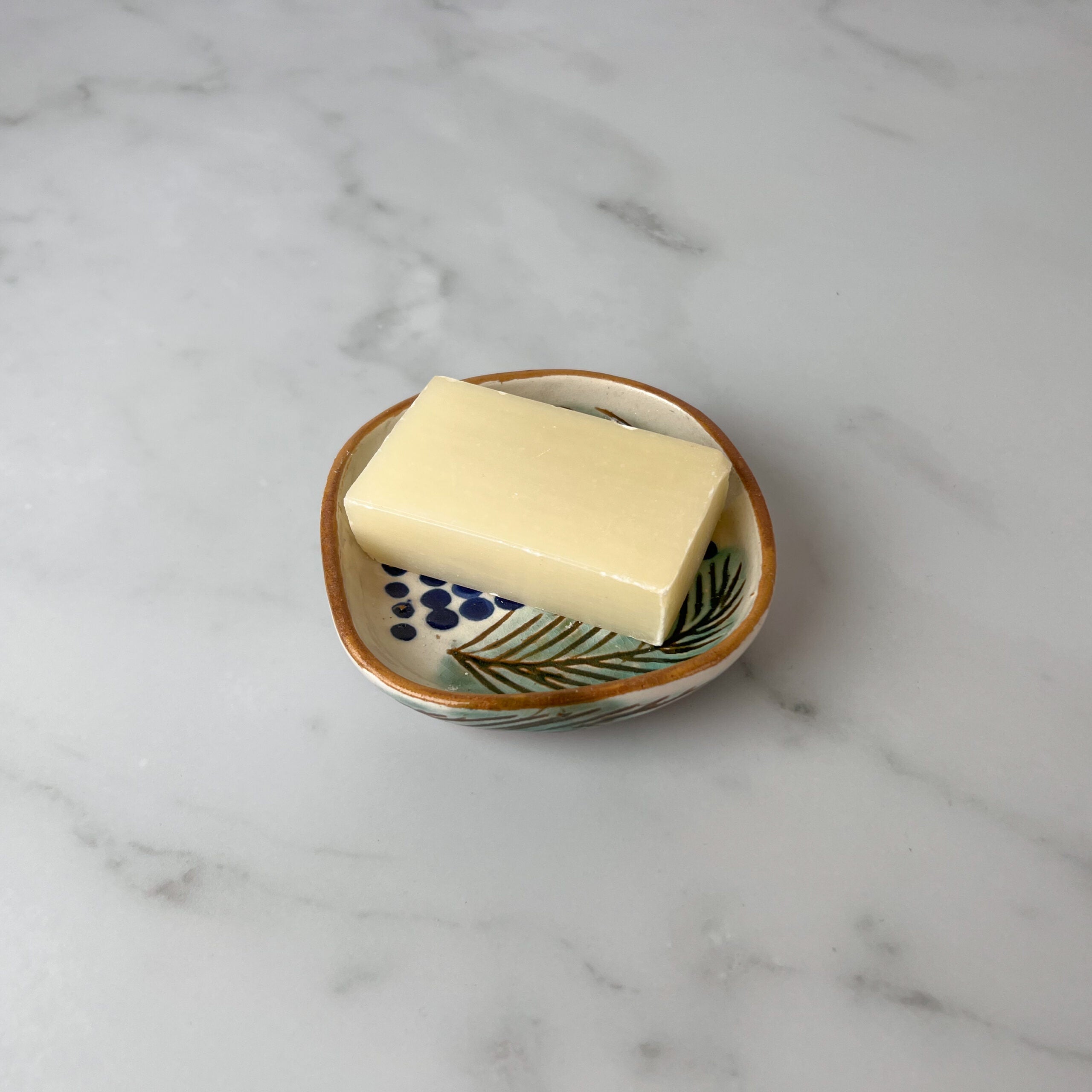 Palm soap dish